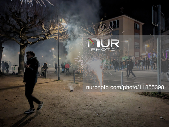 In Frankfurt am Main, Hesse, Germany, on January 1, 2024, people celebrate New Year's Eve by setting off fireworks, bangers, and firecracker...