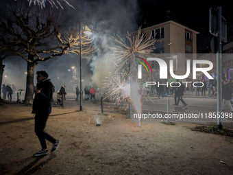 In Frankfurt am Main, Hesse, Germany, on January 1, 2024, people celebrate New Year's Eve by setting off fireworks, bangers, and firecracker...