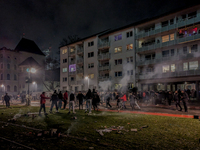 In Frankfurt am Main, Hesse, Germany, on January 1, 2024, people celebrate New Year's Eve by setting off fireworks, bangers, and firecracker...