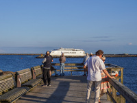 People look at the Bornholmslinjen ferry going to Bornholm Island in Ystad, Sweden, on August 4, 2024 (