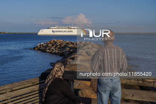 People look at the Bornholmslinjen ferry going to Bornholm Island in Ystad, Sweden, on August 4, 2024 