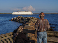 People look at the Bornholmslinjen ferry going to Bornholm Island in Ystad, Sweden, on August 4, 2024 (