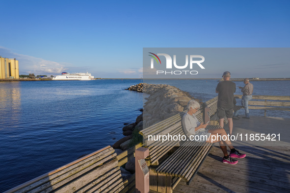 People look at the Bornholmslinjen ferry going to Bornholm Island in Ystad, Sweden, on August 4, 2024 