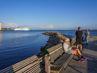 People look at the Bornholmslinjen ferry going to Bornholm Island in Ystad, Sweden, on August 4, 2024 (