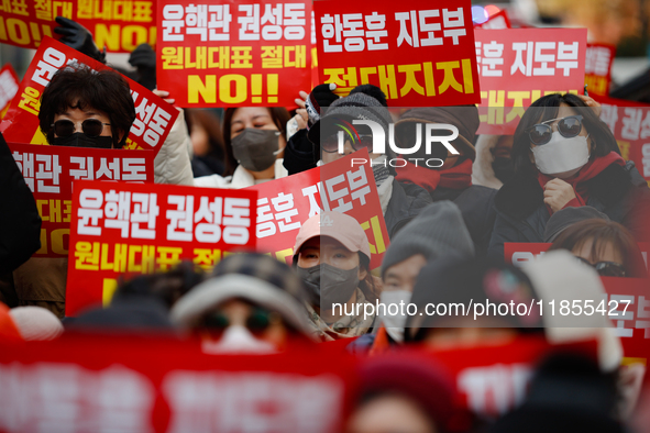 Dozens of supporters of People Power Party leader Han Dong-hoon gather for a rally in front of the party's central headquarters in Yeouido,...