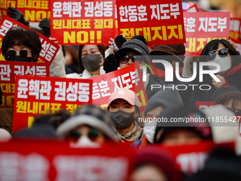 Dozens of supporters of People Power Party leader Han Dong-hoon gather for a rally in front of the party's central headquarters in Yeouido,...