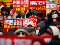 Dozens of supporters of People Power Party leader Han Dong-hoon gather for a rally in front of the party's central headquarters in Yeouido,...