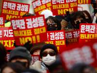 Dozens of supporters of People Power Party leader Han Dong-hoon gather for a rally in front of the party's central headquarters in Yeouido,...