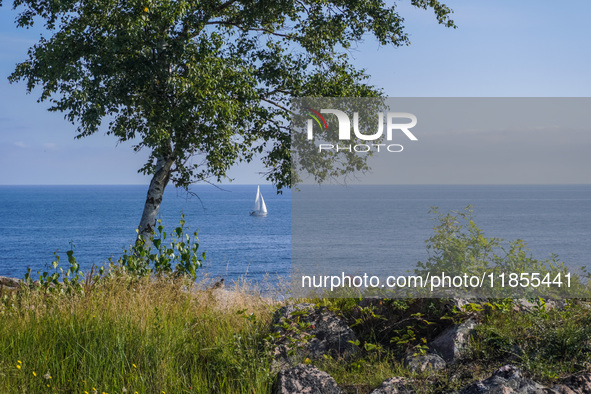 The rocky coast of the Baltic Sea is seen in Gudhjem, Bornholm Island, Denmark, on August 6, 2024 