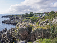 The rocky coast of the Baltic Sea is seen in Gudhjem, Bornholm Island, Denmark, on August 6, 2024 (