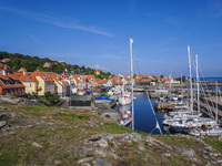 A general view of the old town and port is seen in Gudhjem, Bornholm Island, Denmark, on August 6, 2024. (