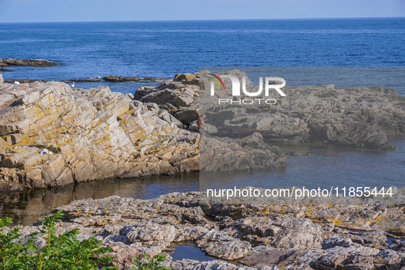 The rocky coast of the Baltic Sea is seen in Gudhjem, Bornholm Island, Denmark, on August 6, 2024 