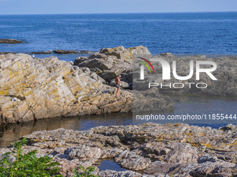 The rocky coast of the Baltic Sea is seen in Gudhjem, Bornholm Island, Denmark, on August 6, 2024 (