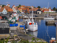 A general view of the old town and port is seen in Gudhjem, Bornholm Island, Denmark, on August 6, 2024. (