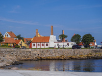 A general view of the old town and port is seen in Gudhjem, Bornholm Island, Denmark, on August 6, 2024. (