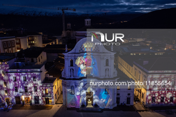 An aerial view shows Santa Maria del Suffragio church (well known as ''Holy Souls Church'') lighted by Christmas lights in Piazza Duomo Squa...