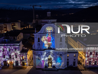 An aerial view shows Santa Maria del Suffragio church (well known as ''Holy Souls Church'') lighted by Christmas lights in Piazza Duomo Squa...