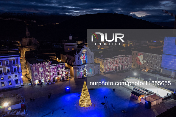 An aerial view shows Christmas lights and decorations in Piazza Duomo Square in L'Aquila, Italy, on december 10th, 2024. 