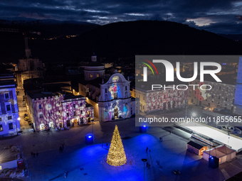 An aerial view shows Christmas lights and decorations in Piazza Duomo Square in L'Aquila, Italy, on december 10th, 2024. (