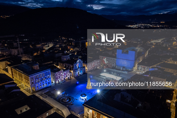 An aerial view shows Christmas lights and decorations in Piazza Duomo Square in L'Aquila, Italy, on december 10th, 2024. 