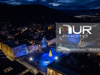 An aerial view shows Christmas lights and decorations in Piazza Duomo Square in L'Aquila, Italy, on december 10th, 2024. (