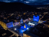 An aerial view shows Christmas lights and decorations in Piazza Duomo Square in L'Aquila, Italy, on december 10th, 2024. (