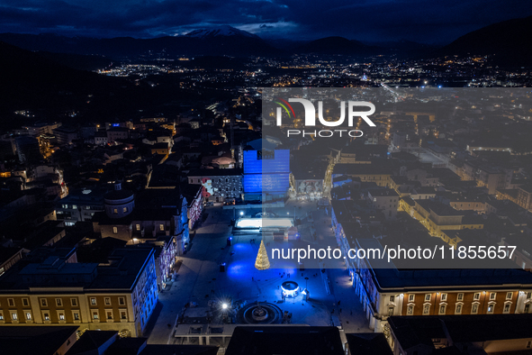 An aerial view shows Christmas lights and decorations in Piazza Duomo Square in L'Aquila, Italy, on december 10th, 2024. 