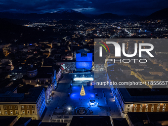 An aerial view shows Christmas lights and decorations in Piazza Duomo Square in L'Aquila, Italy, on december 10th, 2024. (