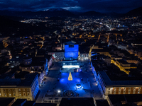 An aerial view shows Christmas lights and decorations in Piazza Duomo Square in L'Aquila, Italy, on december 10th, 2024. (