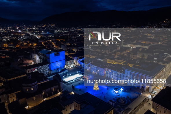 An aerial view shows Christmas lights and decorations in Piazza Duomo Square in L'Aquila, Italy, on december 10th, 2024. 