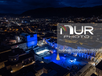 An aerial view shows Christmas lights and decorations in Piazza Duomo Square in L'Aquila, Italy, on december 10th, 2024. (