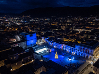 An aerial view shows Christmas lights and decorations in Piazza Duomo Square in L'Aquila, Italy, on december 10th, 2024. (