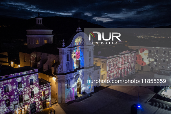 An aerial view shows Santa Maria del Suffragio church (well known as ''Holy Souls Church'') lighted by Christmas lights in Piazza Duomo Squa...