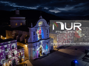 An aerial view shows Santa Maria del Suffragio church (well known as ''Holy Souls Church'') lighted by Christmas lights in Piazza Duomo Squa...