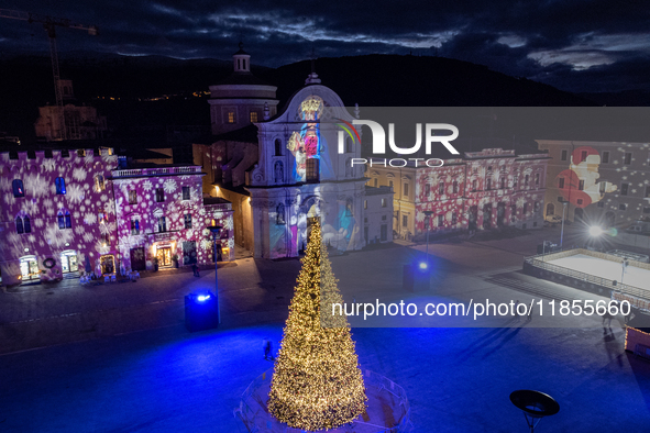 An aerial view shows Christmas lights and decorations in Piazza Duomo Square in L'Aquila, Italy, on december 10th, 2024. 