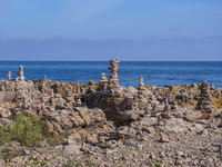 A general view of the rocky coast of the Baltic Sea in Gudhjem, Bornholm Island, Denmark, on August 6, 2024 (