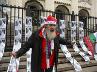 A lone protester stands against former Prime Minister Boyko Borisov, who served between 2009 and 2021 and is the leader of the party GERB (C...