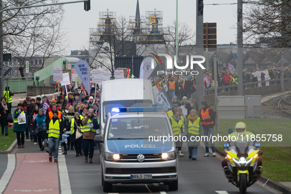 Thousands of public sector workers from several non-public organizations, German labor unions, and care day workers march for better pay and...