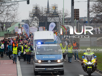 Thousands of public sector workers from several non-public organizations, German labor unions, and care day workers march for better pay and...