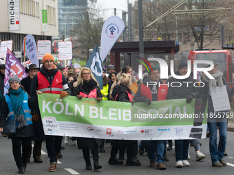 Thousands of public sector workers from several non-public organizations, German labor unions, and care day workers march for better pay and...