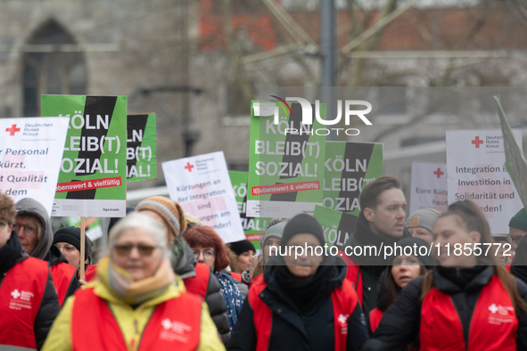 Thousands of public sector workers from several non-public organizations, German labor unions, and care day workers march for better pay and...