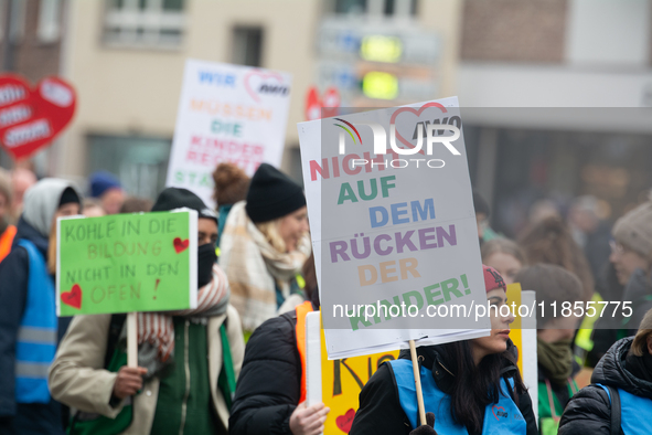 Thousands of public sector workers from several non-public organizations, German labor unions, and care day workers march for better pay and...