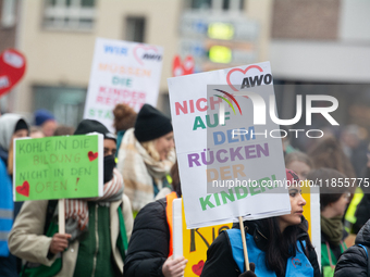 Thousands of public sector workers from several non-public organizations, German labor unions, and care day workers march for better pay and...