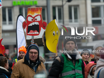 Thousands of public sector workers from several non-public organizations, German labor unions, and care day workers march for better pay and...