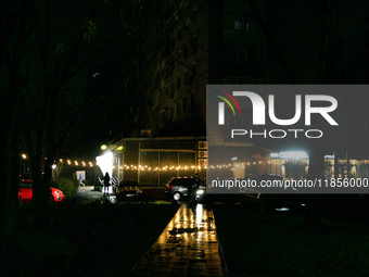 String lights illuminate a street in the Rusanivka neighborhood during a power cut in Kyiv, Ukraine, on December 7, 2024. (