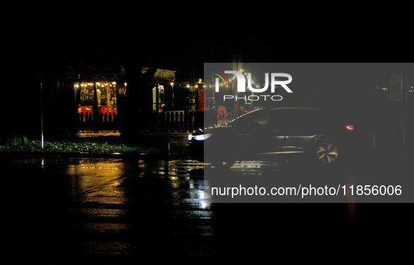 A car is at a zebra crossing during a power cut in the Rusanivka neighborhood in Kyiv, Ukraine, on December 7, 2024. NO USE RUSSIA. NO USE B...