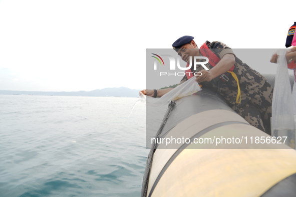 The Director General of Marine Resources and Fisheries Supervision (PSDKP), Pung Nugroho Saksono, releases Clear Lobster Seeds (BBL) confisc...