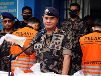 The Director General of Marine Resources and Fisheries Supervision (PSDKP), Pung Nugroho Saksono, shows evidence of Clear Lobster Seeds (BBL...