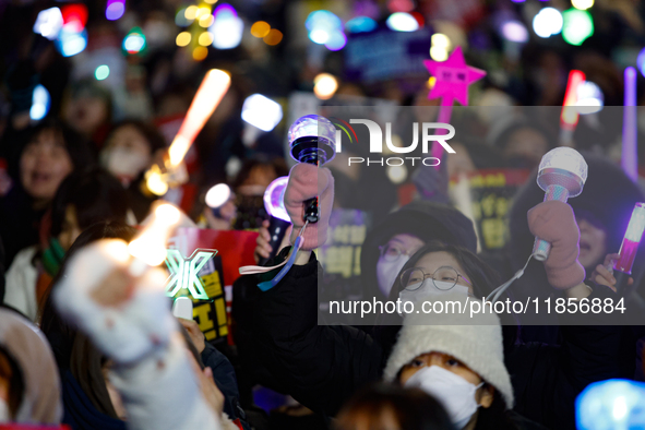 Thousands of citizens gather across from the National Assembly in Seoul, South Korea, on December 11, 2024, to call for the impeachment of P...