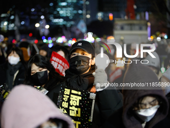 Thousands of citizens gather across from the National Assembly in Seoul, South Korea, on December 11, 2024, to call for the impeachment of P...